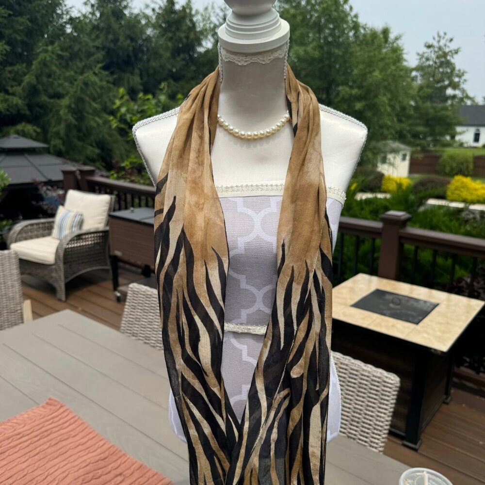 Zebra Print Lightweight Scarf Fierce and sheer — this zebra print scarf bring
